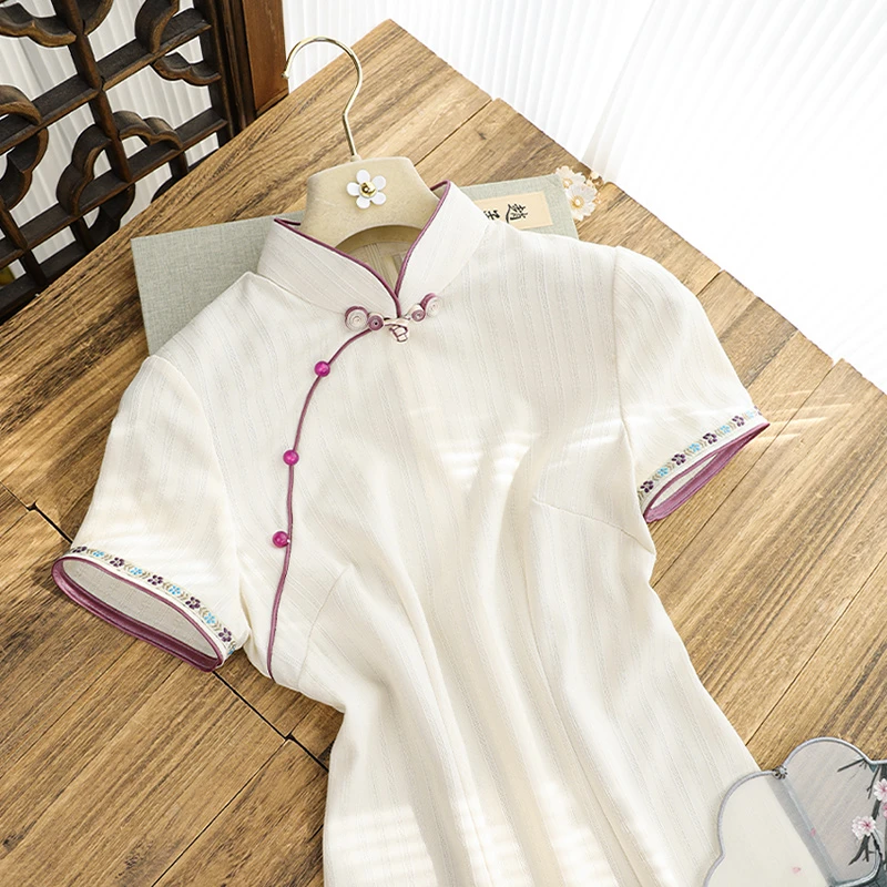 俏娘鱼2025春夏新款米白素雅淑女范新中式改良短袖旗袍女日常可穿