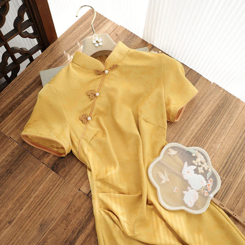 俏娘鱼2025春夏新款素雅黄色文艺范改良新中式短袖旗袍女日常可穿