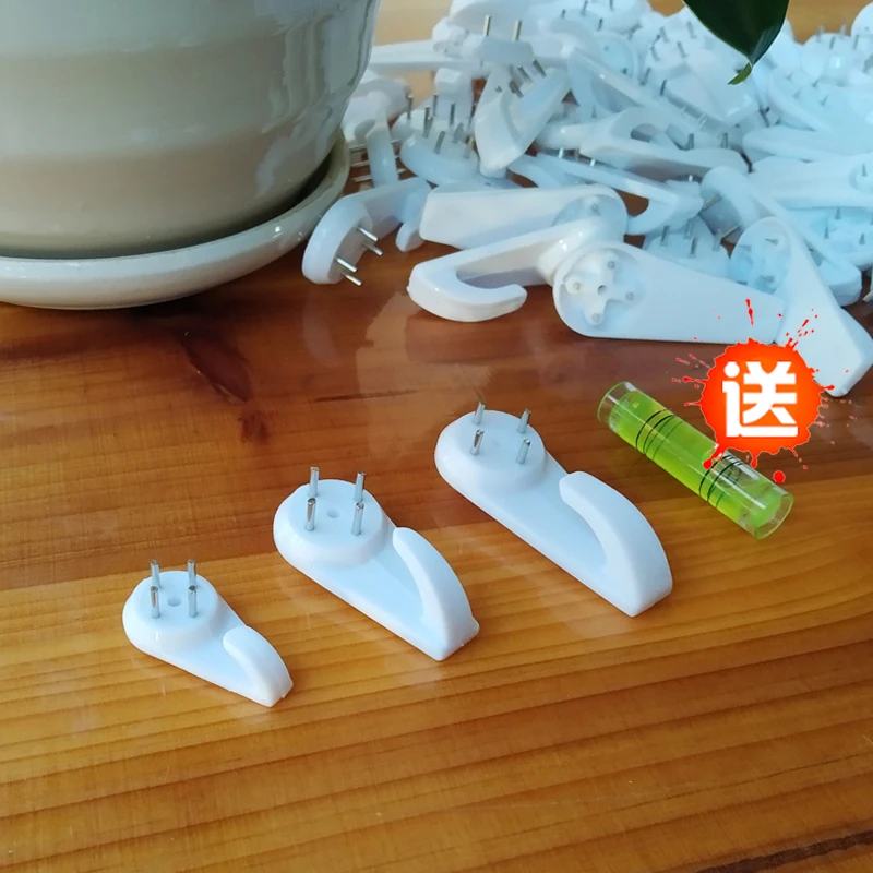 无痕钉挂画强力墙上挂钩免打孔壁挂墙钉婚纱照专用钉子水泥钉钢钉