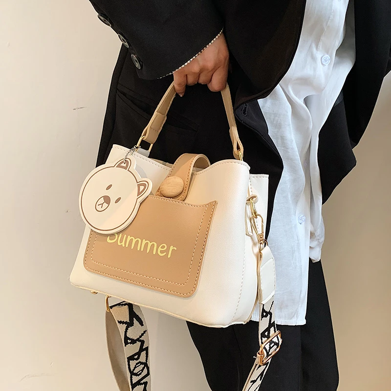 送挂件包包女2023夏新款气质百搭斜挎包宽肩带时尚小包网红水桶包