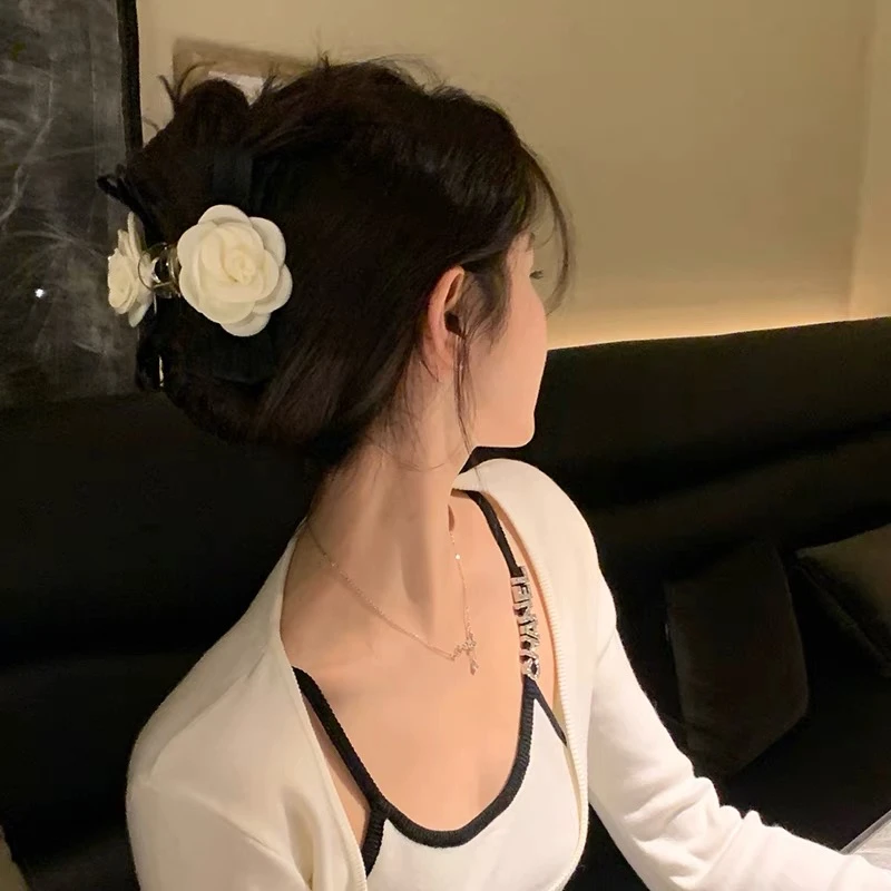 山茶花抓夹黑色蝴蝶结发抓高级感优雅气质鲨鱼夹女