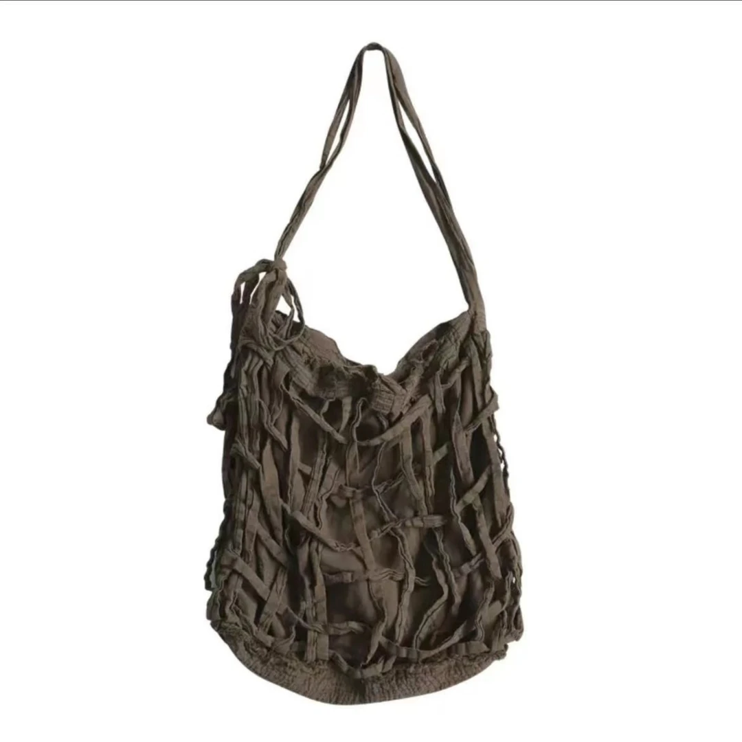 7折左岸迷香·贞琦坊【包】款号：Z22SS0054 百搭休闲时尚