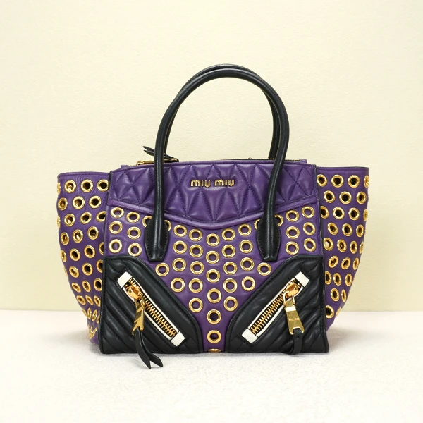 95新 奢小喵 缪缪 紫拼黑镂空手提包 22051001