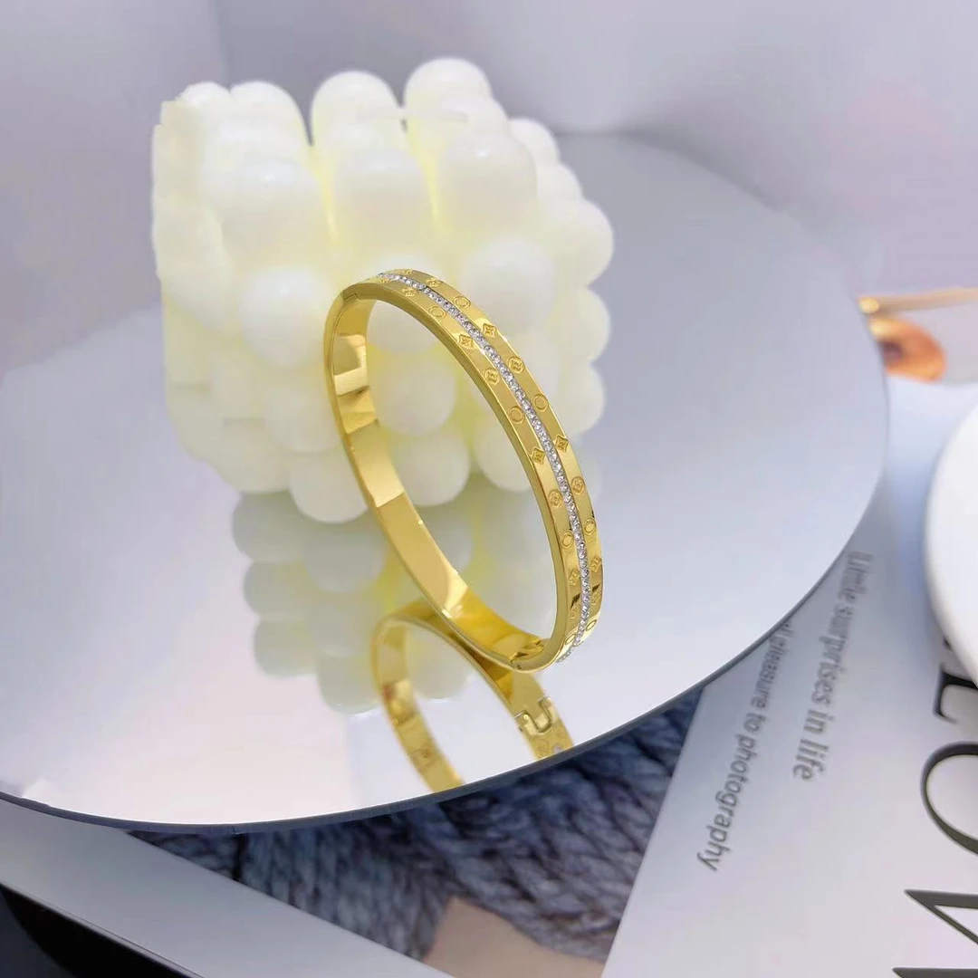 钛钢手镯 时尚新款定制潮流花花女款手镯1363