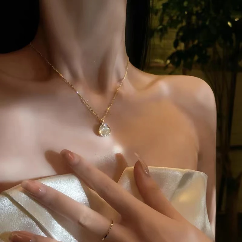 钛钢项链 新款2023可旋转圆形吊坠猫猫石2023新款气质温柔不掉色