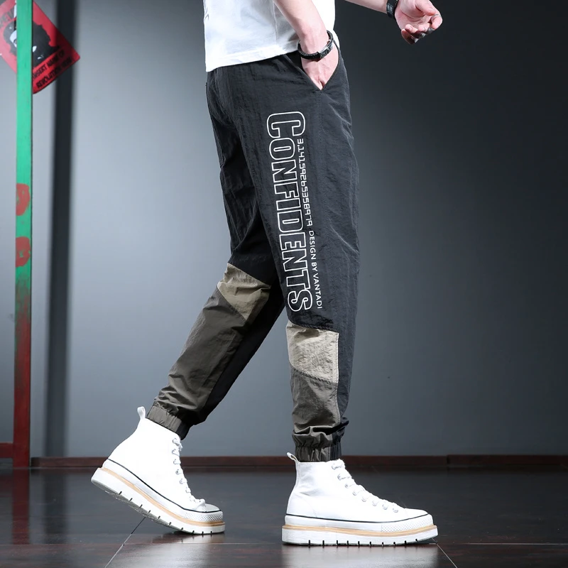 高端重磅撞色拼接休闲裤男秋冬款系带潮流运动速干裤宽松男士束脚