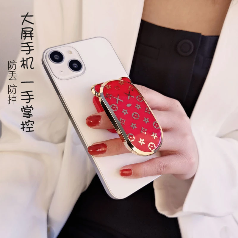 手机支架扣新款潮牌xx小熊耳折叠个性手机壳便携桌面支撑多功能女