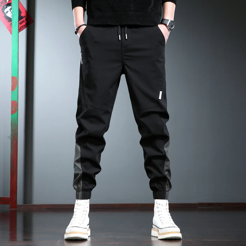 潮牌休闲裤男款宽松束脚长裤春秋季抽绳百搭黑色拼接运动速干裤子