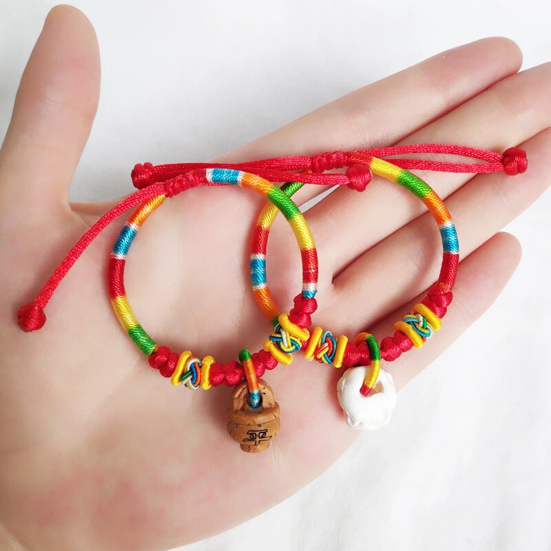 锦绳缘无金属布艺手链宝宝婴儿童新生儿五彩绳红绳桃核桃木手链