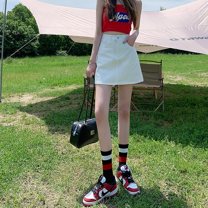 白色牛仔短裙女夏季薄款2024新款高腰显瘦辣妹风包臀a字半身裙子