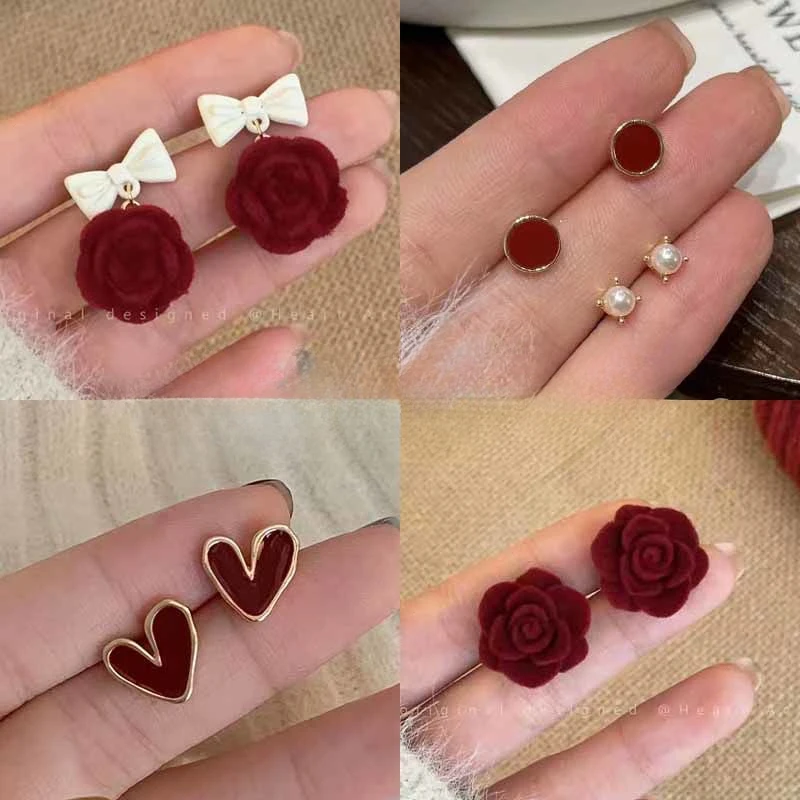 秋冬红色系百搭蝴蝶结珠珠耳钉女喜庆高级感耳饰新款潮新年耳环