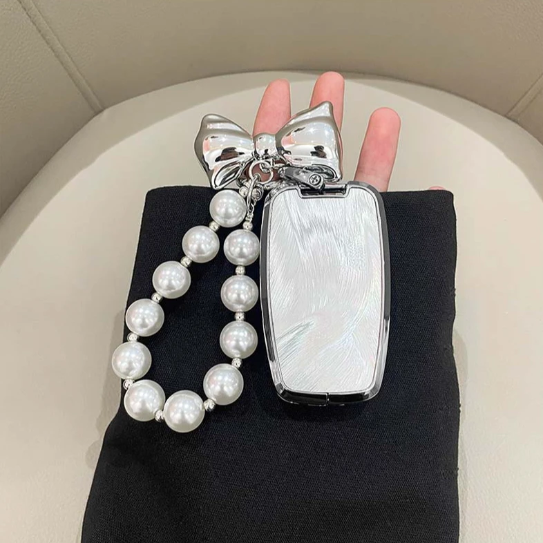 专用丰田钥匙套凯美瑞汉威锋兰达亚洲龙塞纳威飒雷凌壳扣2024款女