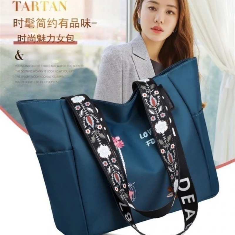 单肩腋下包大容量牛津布女包2025新款通勤时尚绣花手提包托特女包