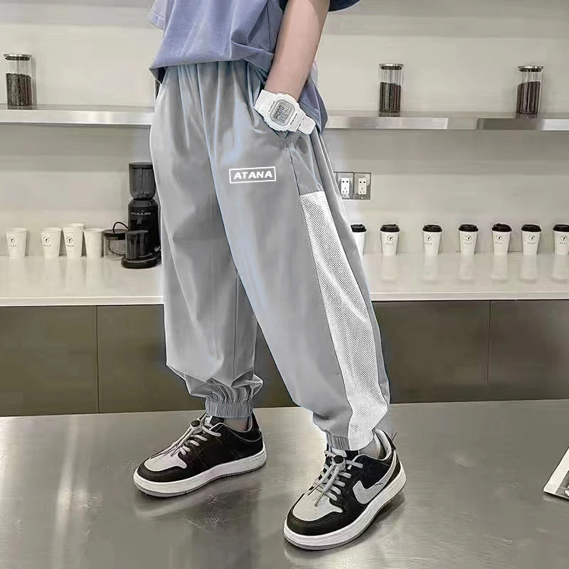 儿童运动裤夏季速干裤网眼透气防蚊裤男童女童韩版时尚宽松裤L265