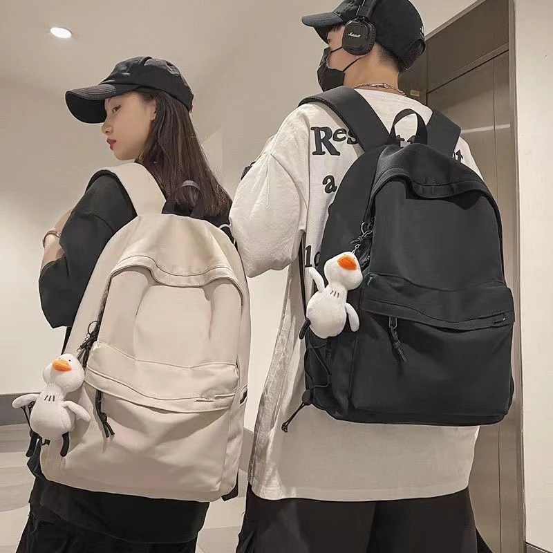 初高中生男款简约大容量双肩包女休闲运动初中生高中大学生书包