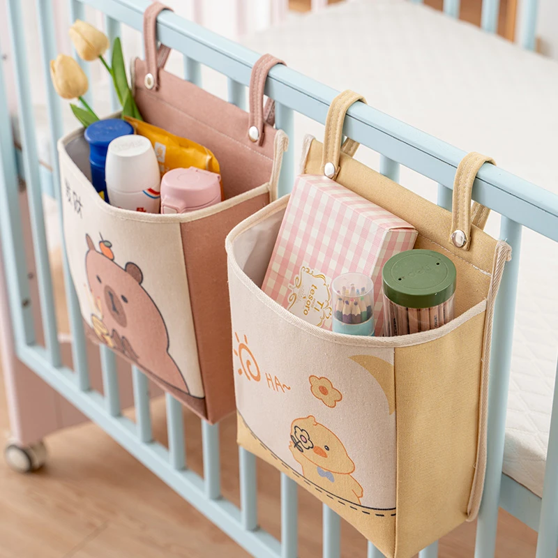 婴儿床边收纳挂袋围栏置物袋床头零食玩具挂篮宿舍上铺手机储物袋