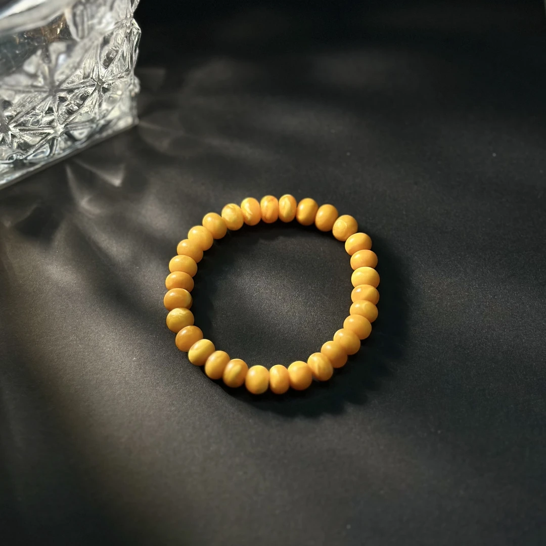 小婵-8mm橘皮纹算盘珠素圈蜜蜡手串