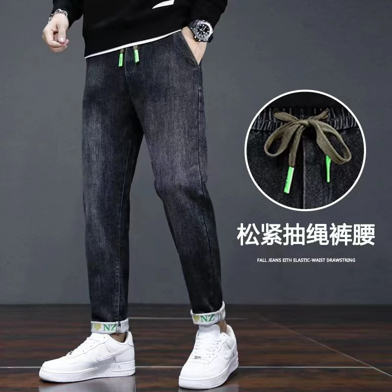 啄木鸟秋冬季新款加绒牛仔裤男松紧腰弹力宽松潮流百搭休闲长裤子