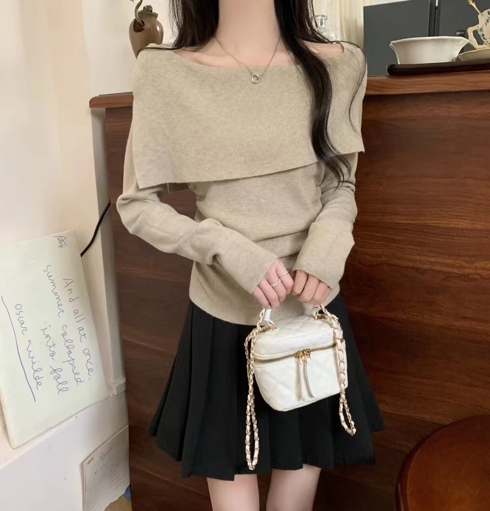 时尚高级设计感针织秋季新款一字肩设计上衣女法式慵懒长袖针织衫