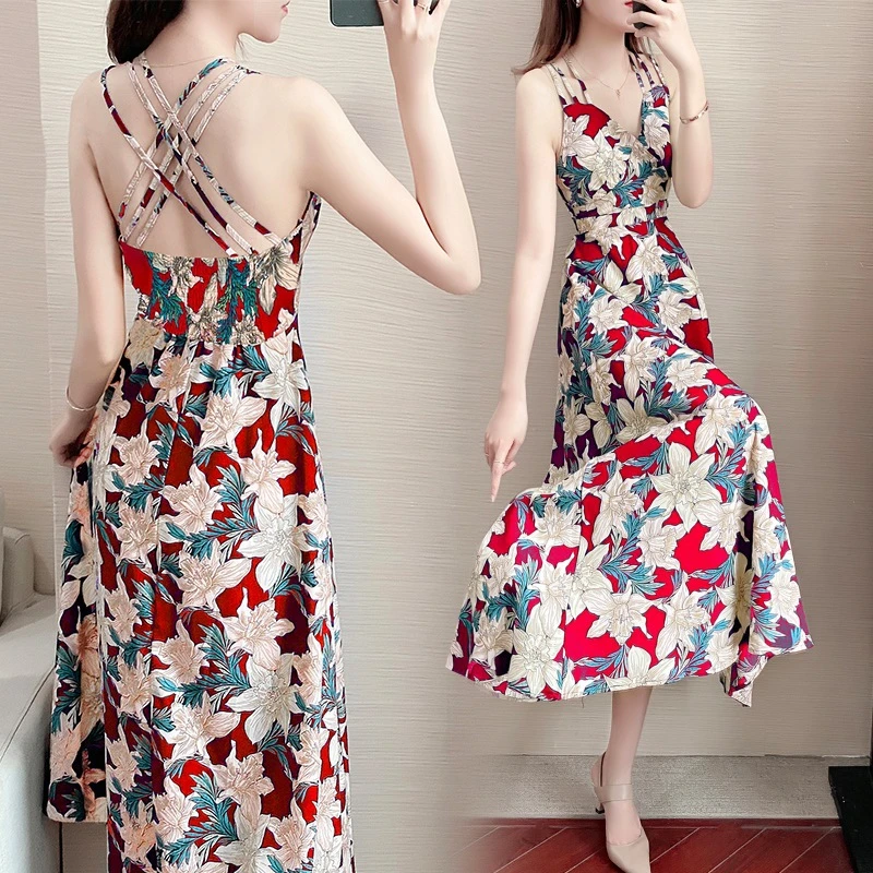 性感碎花吊带连衣裙女夏季新款气质显瘦沙滩度假长款裙子时尚修身