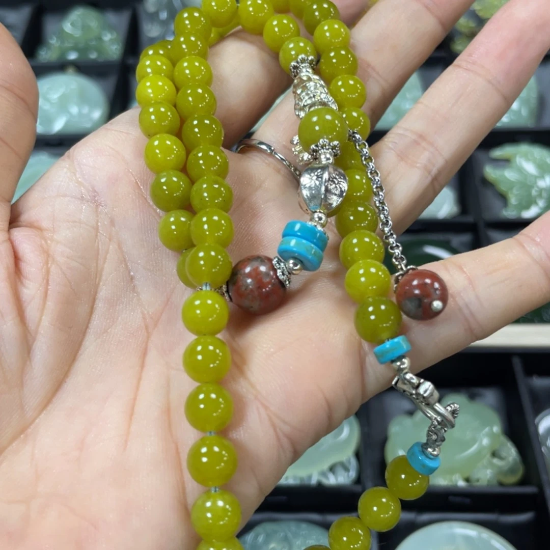蛇纹石玉颈饰合金