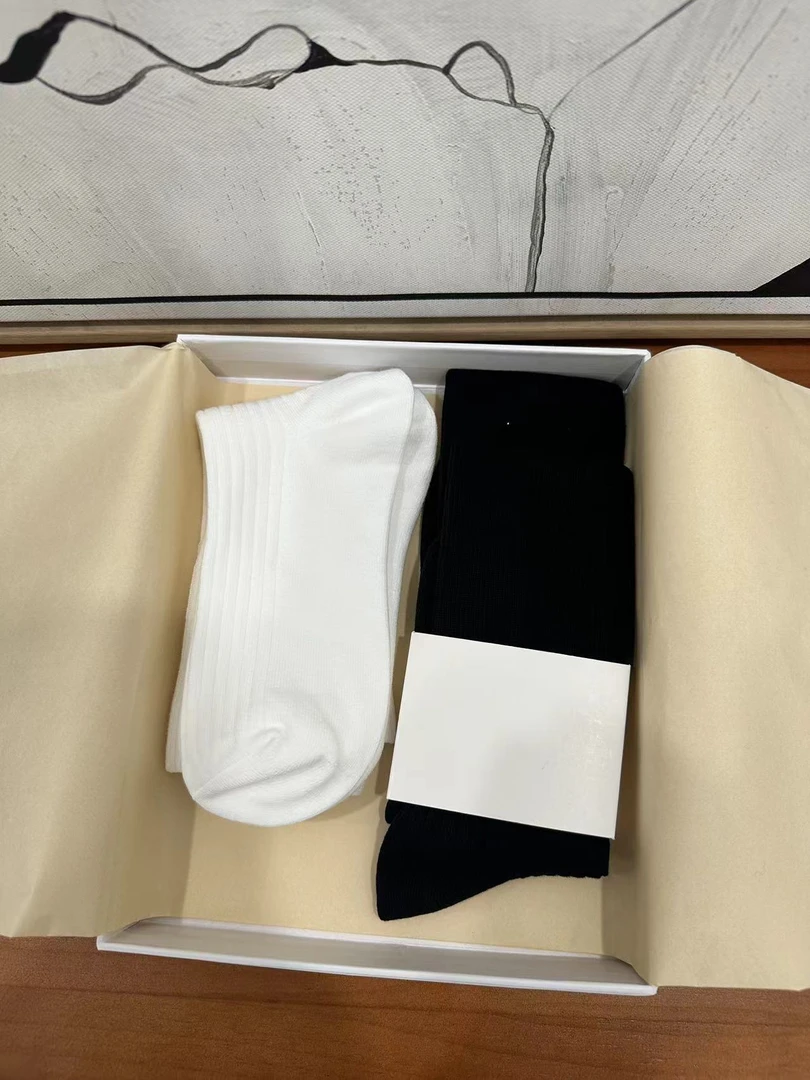 时尚舒适中筒袜男女吸汗防臭透气休闲百搭2双装中筒袜