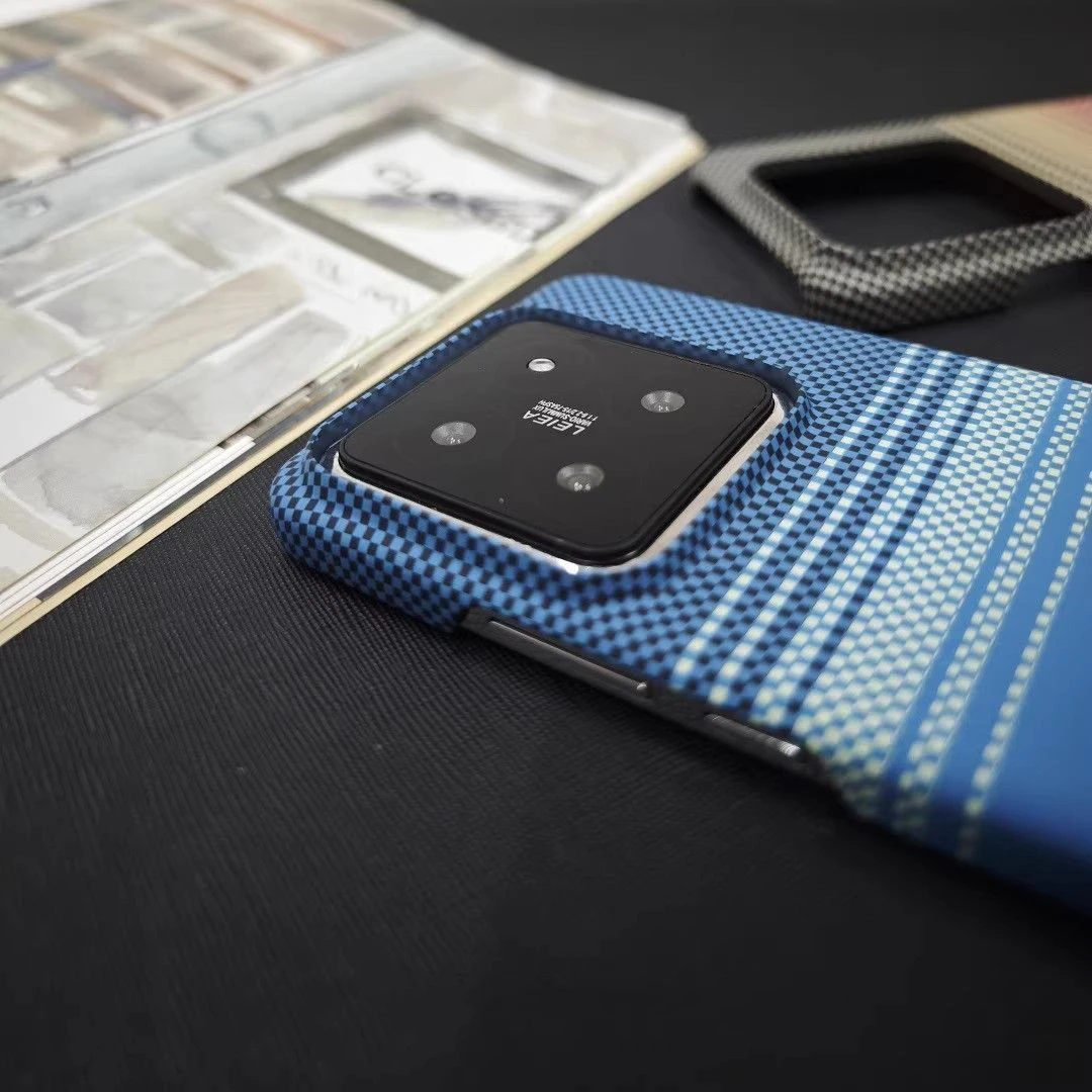 适用小米14手机壳凯夫拉碳纤维纹硬壳半包Xiaomi13pro超薄14ultra