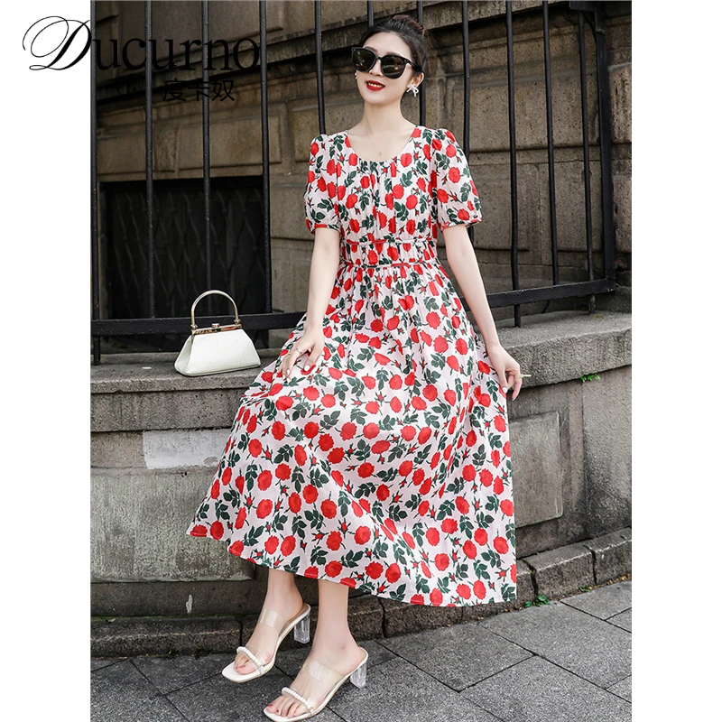多巴胺服装女夏季高端法式气质显瘦出游服装印花长裙连衣裙