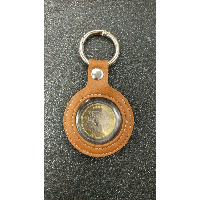 法定货币2024东北虎豹国家公园纪念币、东北虎豹纪念币钥匙扣版