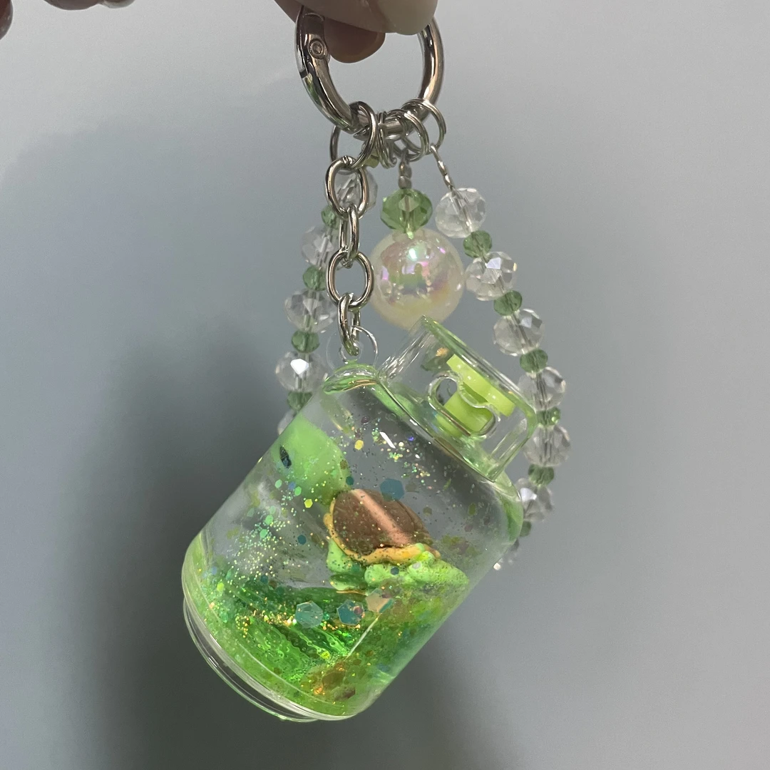 绿色流沙煤气罐手机链D699