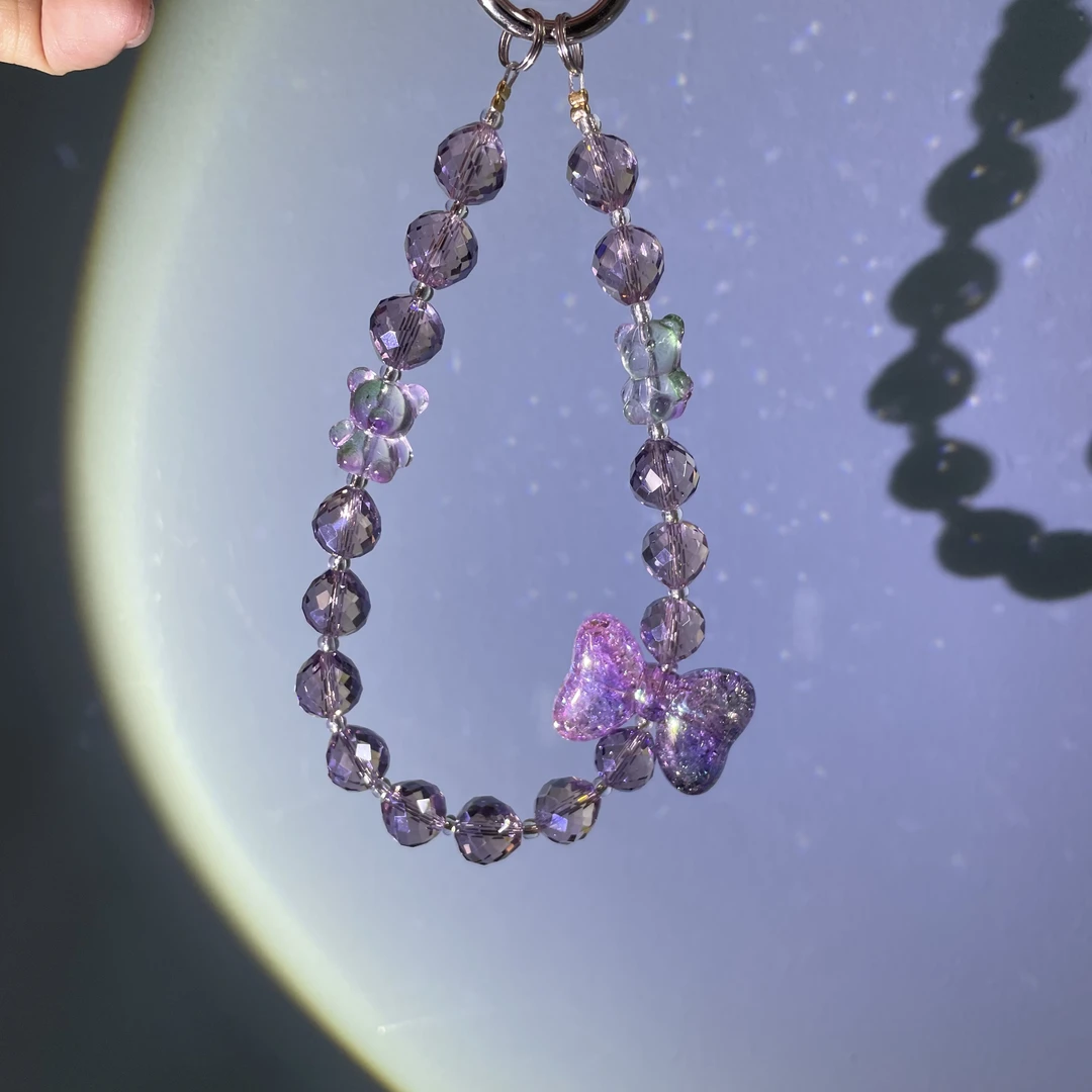 编织灰紫色小熊蝴蝶结手机链C473