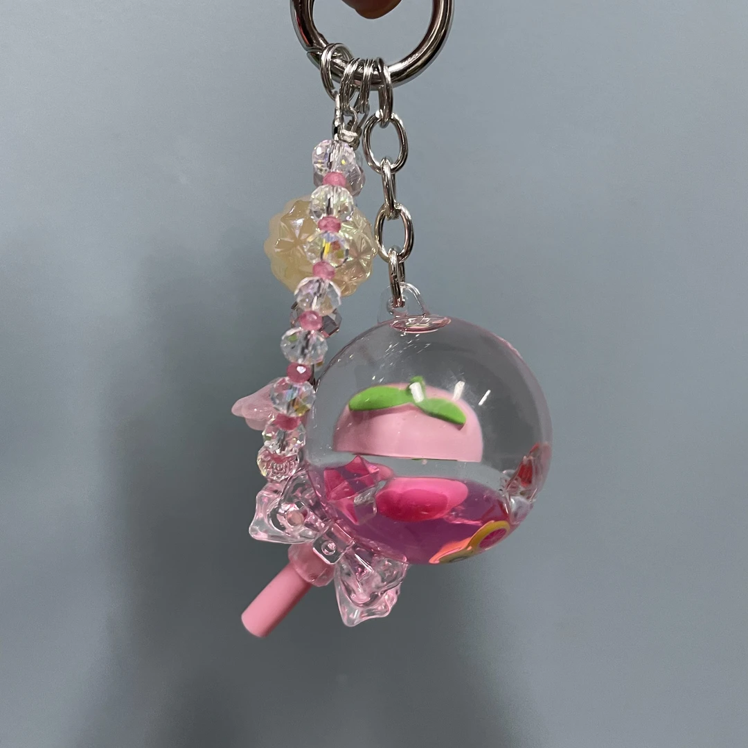 桃粉色流沙棒棒糖手机链D594