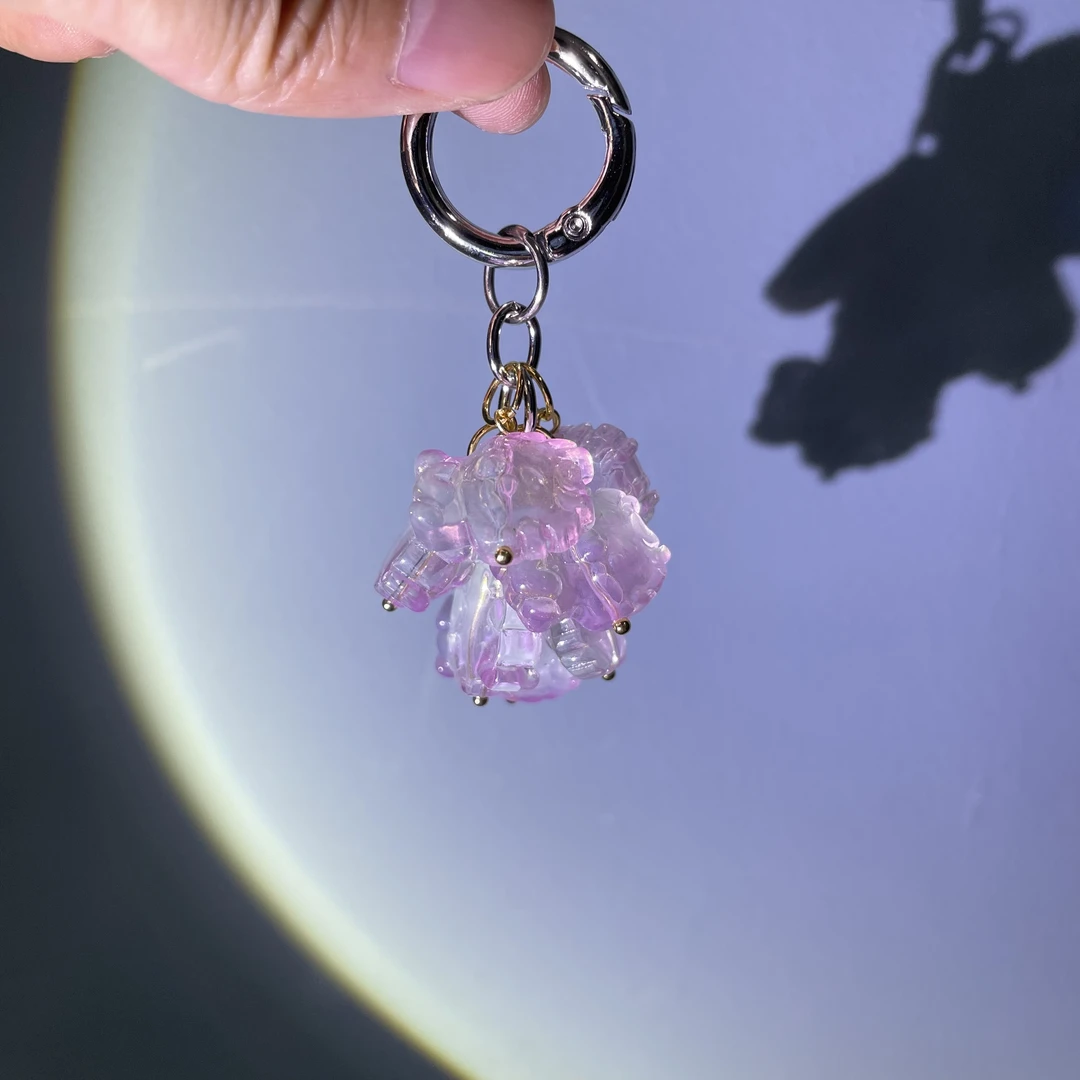 编织粉色一串龙宝宝手机坠C834