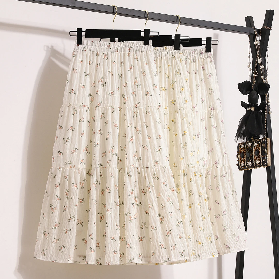 白色碎花半身裙女夏季薄高腰a字显瘦设计感伞裙百搭印花中长裙