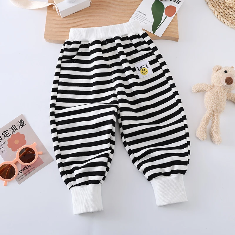 儿童运动裤2025秋季新款休闲百搭男女童洋气宽松条纹卫裤束脚长裤