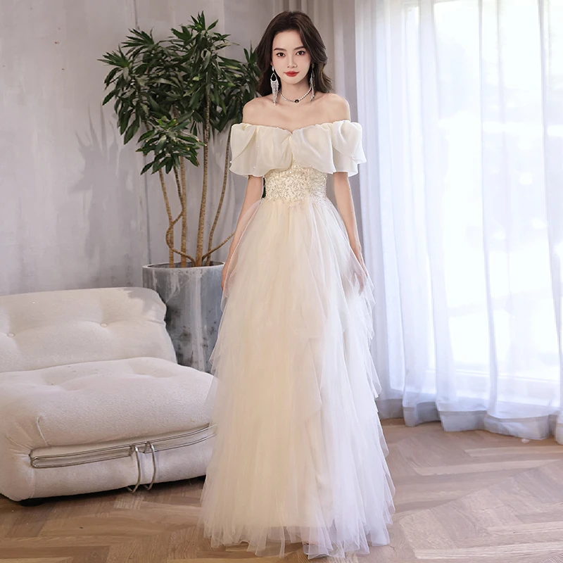 香槟色一字肩高端轻奢新款订婚公主裙生日主持人礼服姐妹团仙气