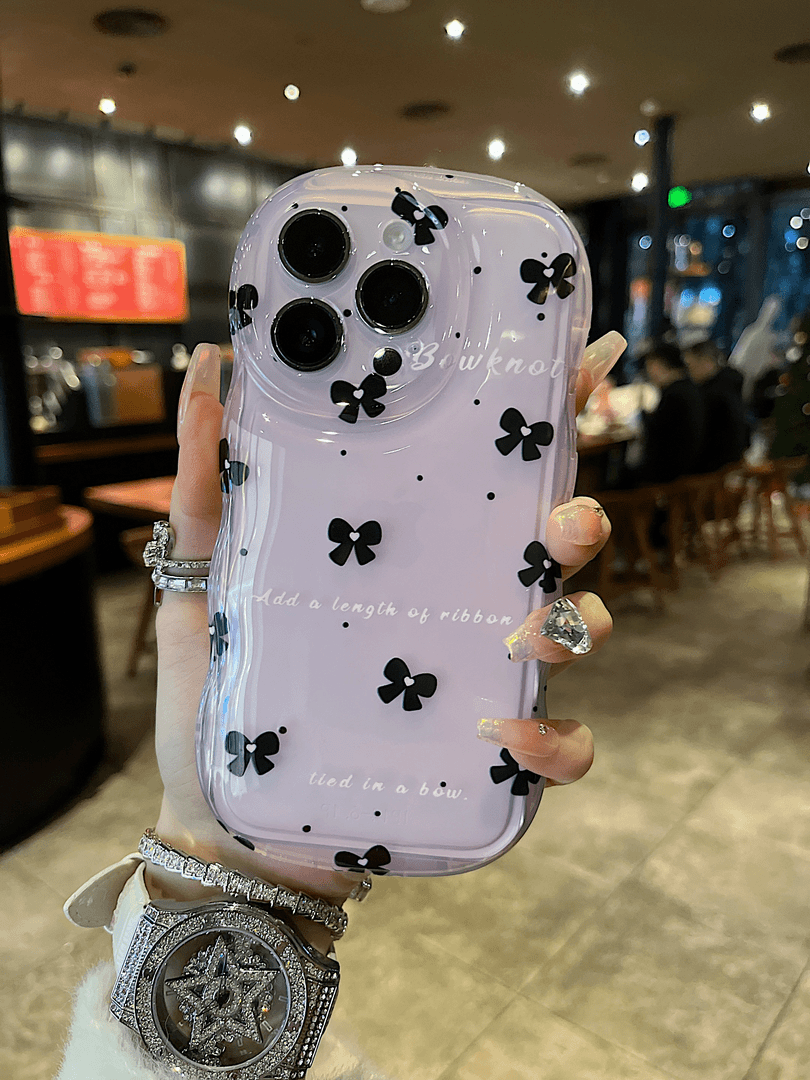 适用苹果系列iPhone15新款手机壳防摔小众气垫紫底蝴蝶结14/13/12