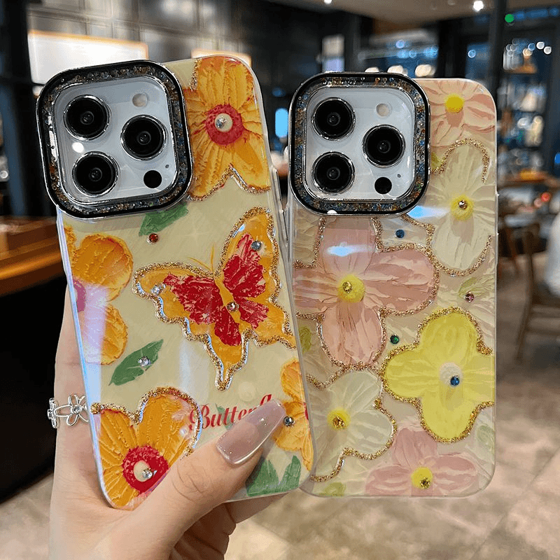 适用苹果系列iPhone15新款手机壳女款镜头流沙闪砖气质橘蝴蝶防摔