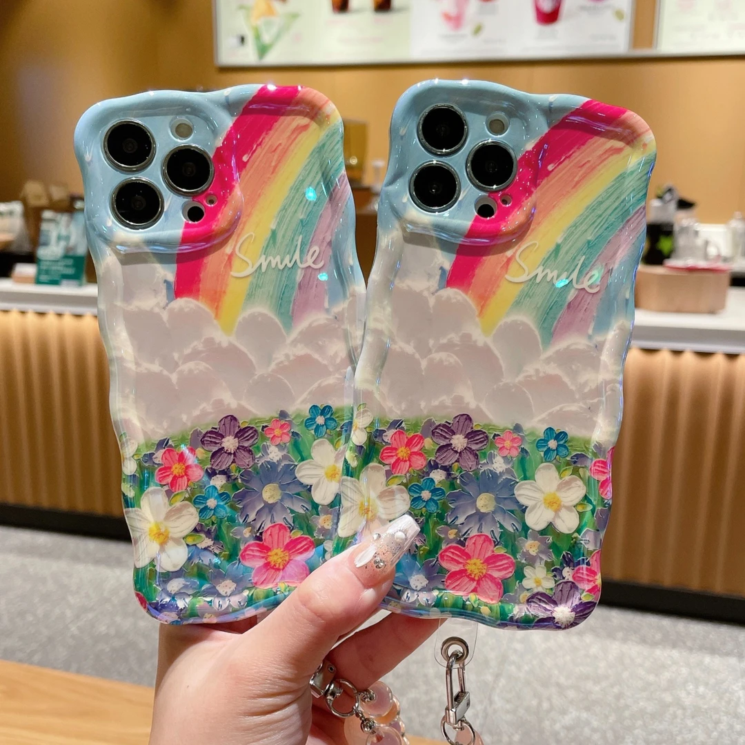 适用苹果系列iPhone14新款手机壳蓝光波浪边油画彩虹彩色花海防摔