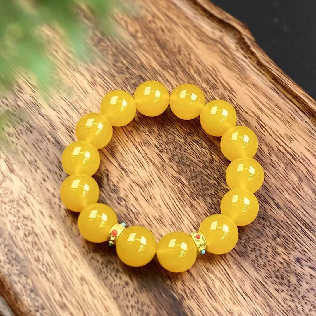 279486/天然玛瑙鸡油黄手串男女同款简单大气款  一件发