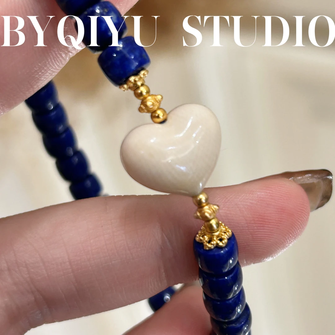 猛犸牙爱心青色算盘珠银手链