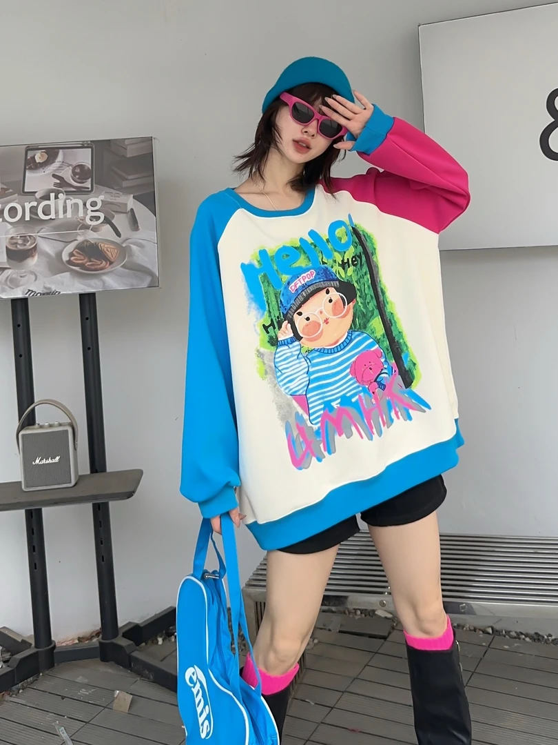 秋季新品长袖可爱眼镜女孩拼接袖子宽松大版圆领卫衣