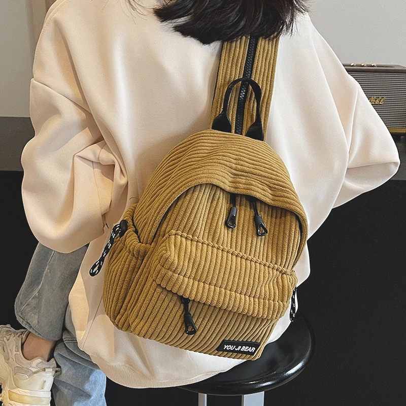 灯芯绒双肩包女2025新款秋冬季多用单肩轻便简约纯色条绒迷你背包