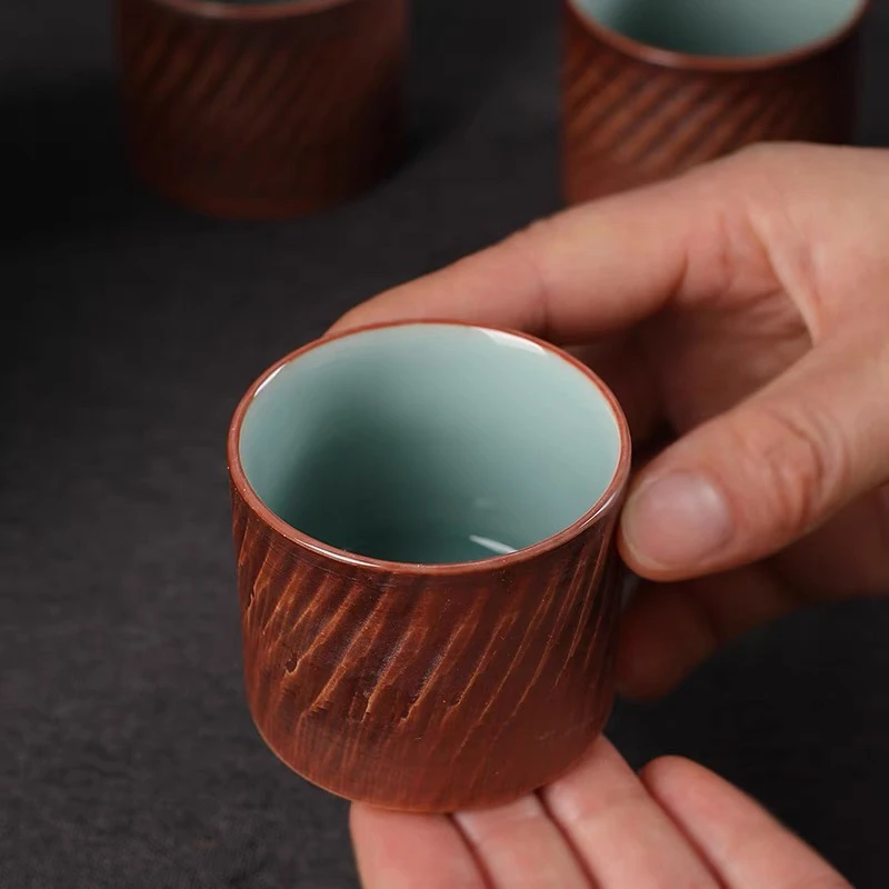 龙泉纯手工青瓷跳刀杯高档弟窑粉青釉草木灰釉结合功夫茶具扳指杯