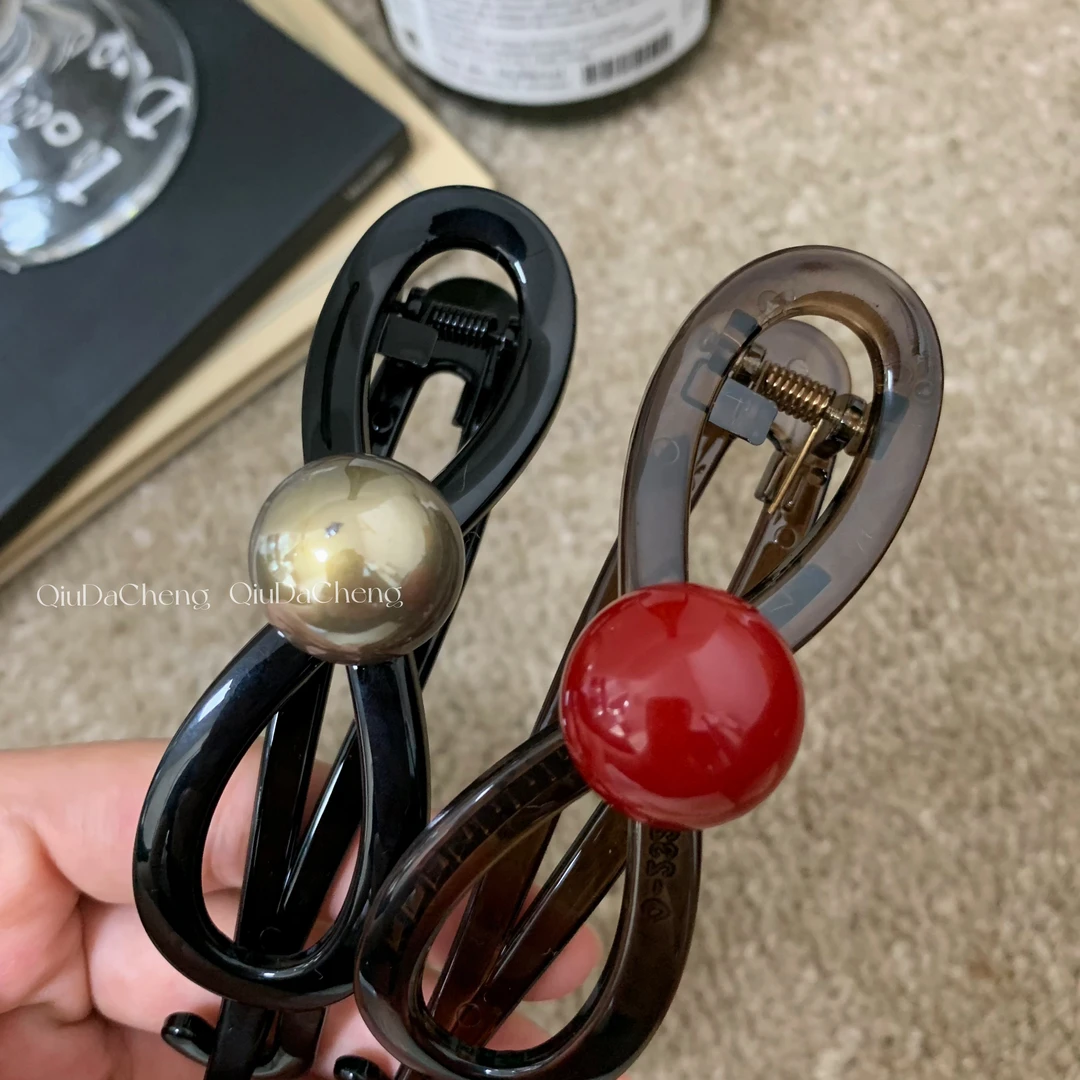 QC-9/20新品 蝴蝶结扭扭夹边夹抓夹