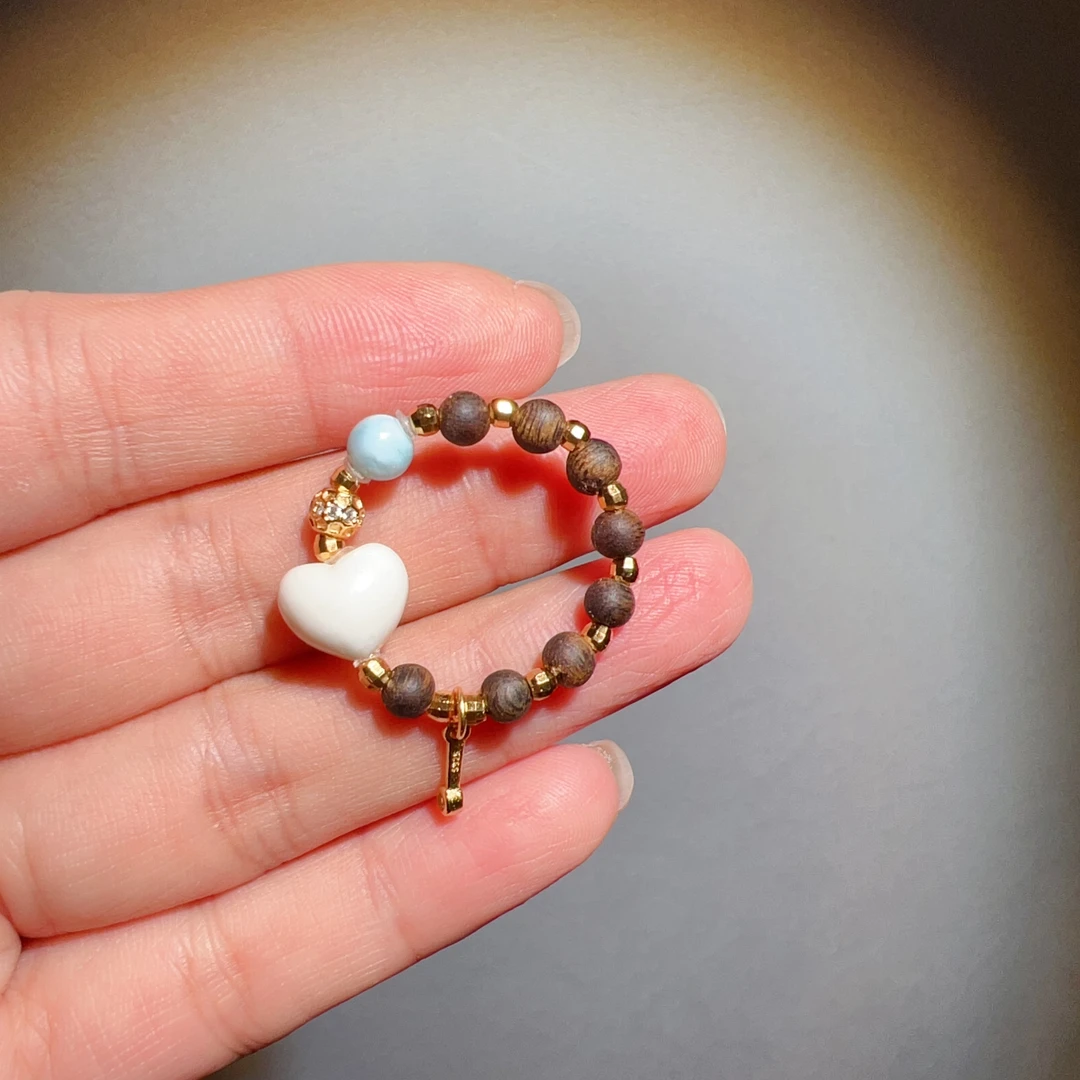 天然无优化爱心猛犸牙戒指弹力绳均码