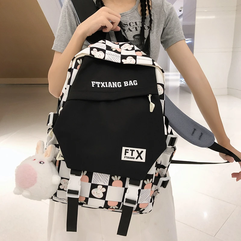 书包女初中生韩版高中生简约百搭背包大学生轻便大容量双肩包