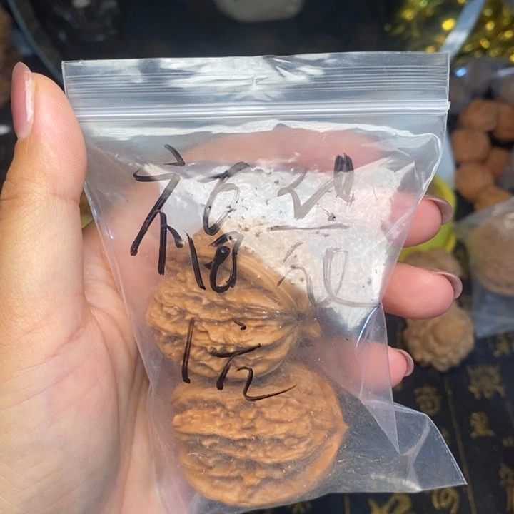 绿***驴文玩核桃手把件福袋
