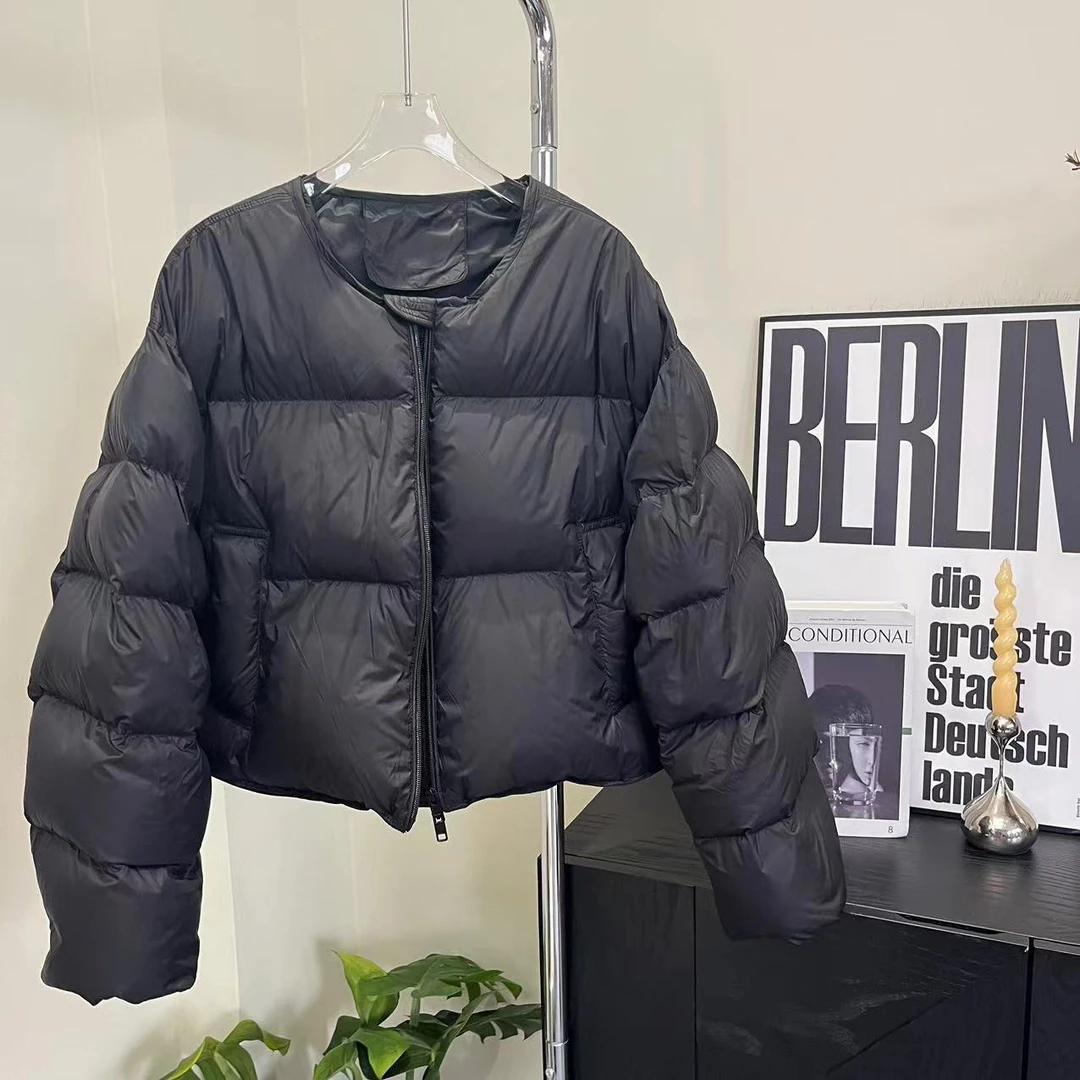 雪儿 X661-1小众款泡芙圆领设计香蕉袖保暖羽绒服外套