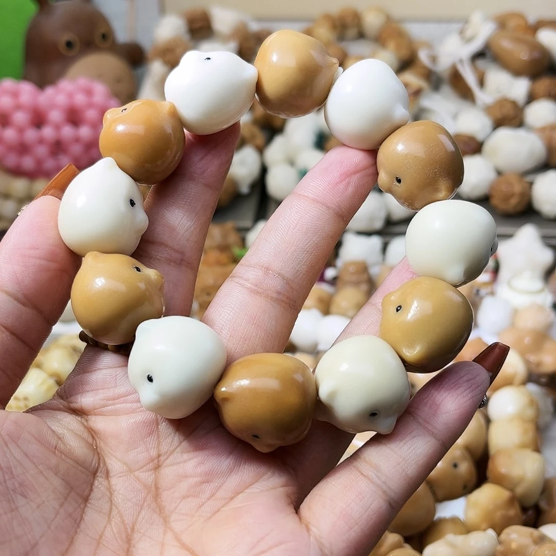 菩提根/象牙果手串小熊头七折